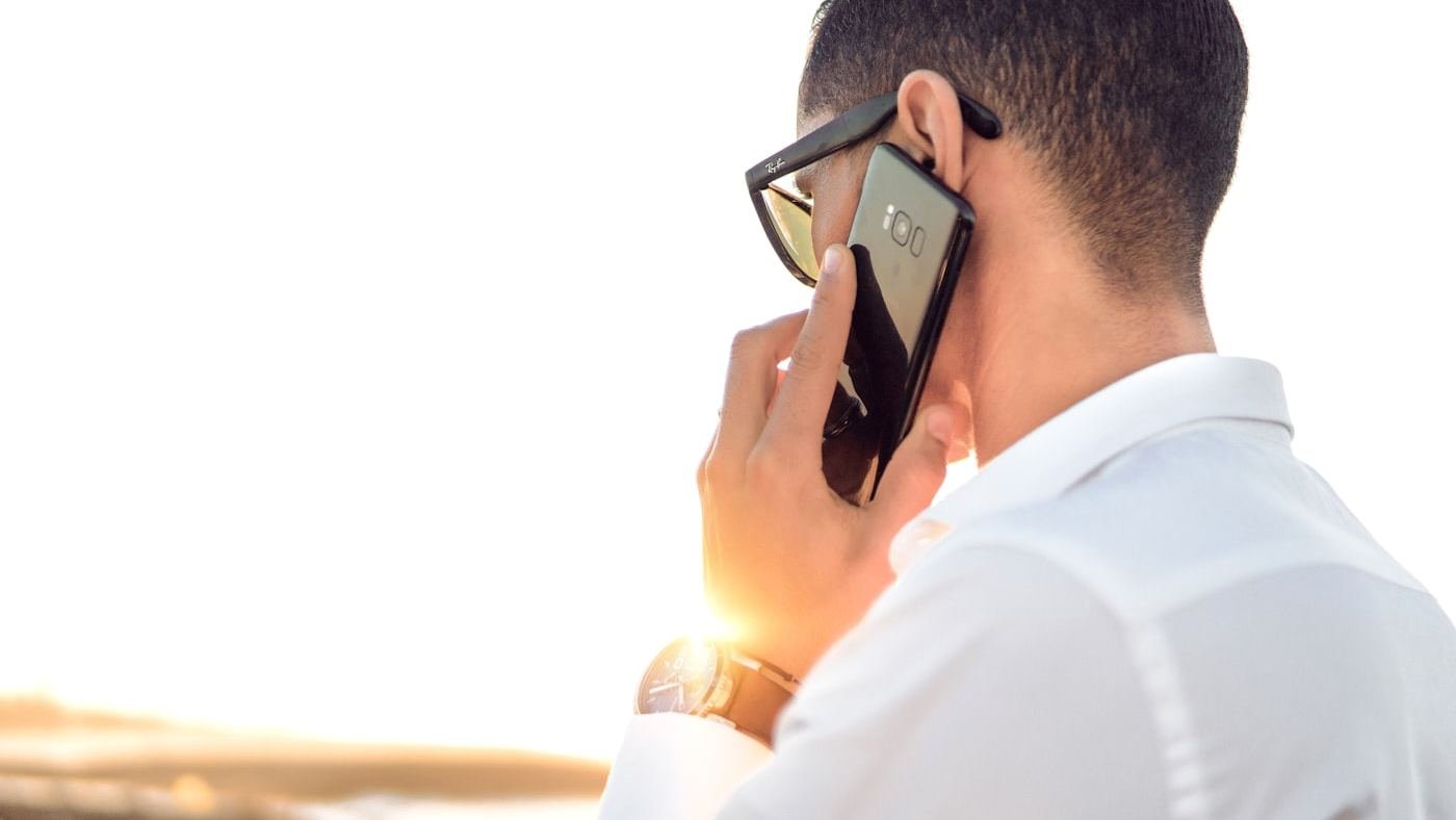 A business owner on the phone to a customer