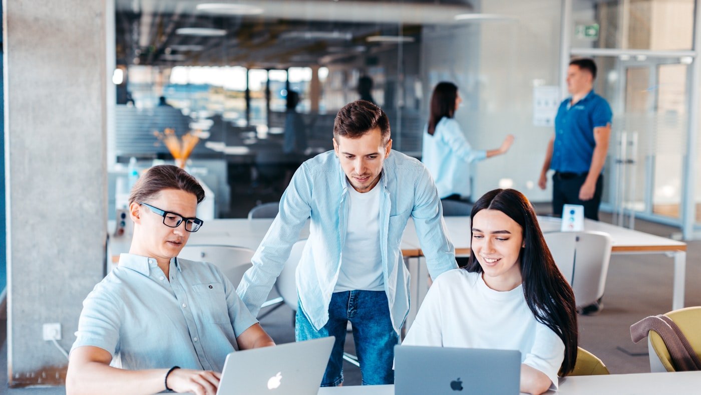 A small team working together over laptops