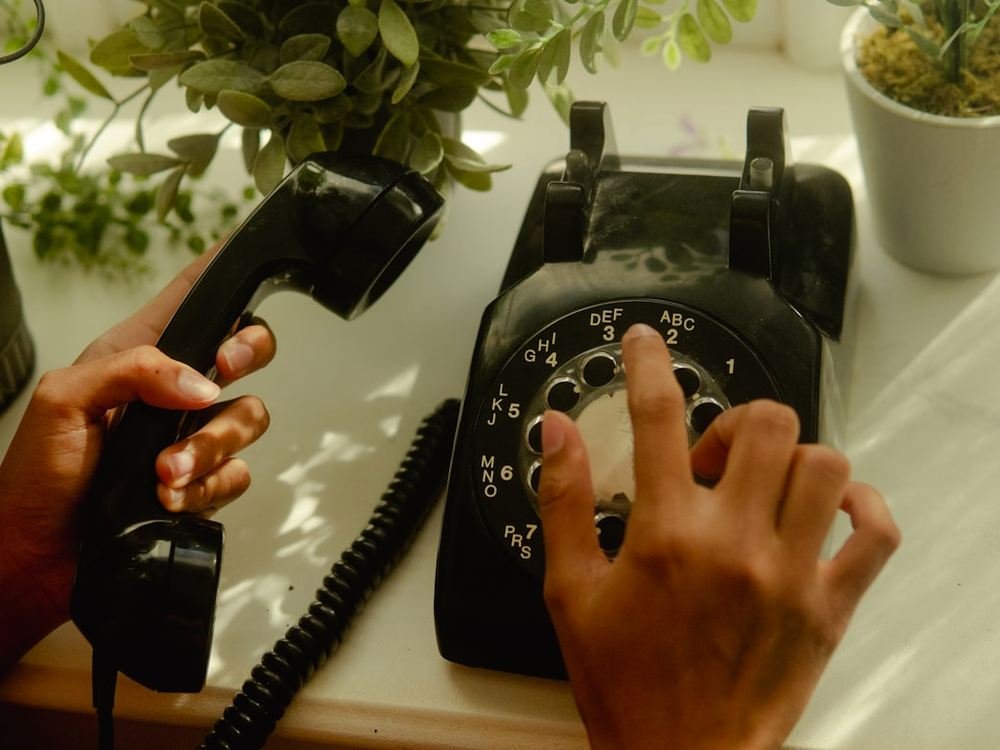 Taking a call at a desk